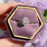 Hidden Ruby Heart Oval Moissanite Ring