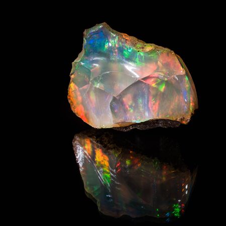 OPAL GEMSTONE: THE OCTOBER BIRTHSTONE WITH  AN INTERWOVEN PLAY OF COLOURS 