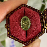 1.66 CT Oval Green Tourmaline: Starbrite Cut by John Dyer