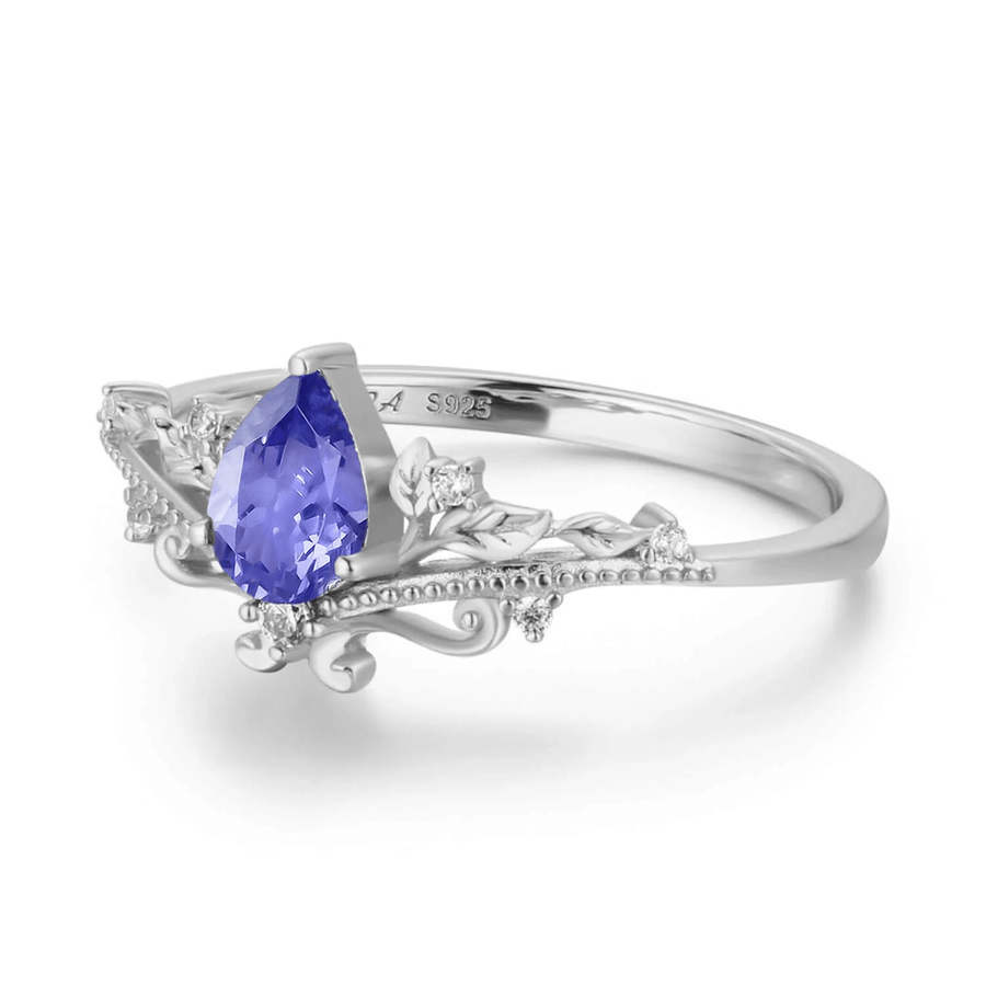 Tanzanite and diamond online ring white gold