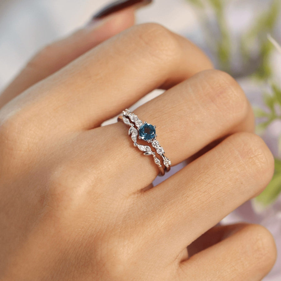 10K White Gold - The Center of the Universe Blue Topaz Ring - Size 8